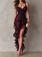 Vestido chic negro y rojo con flores y volantes