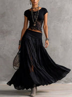 Conjunto de top de encaje negro semitransparente y falda maxi plisada