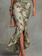 Vestido maxi asimétrico de satén verde con flores