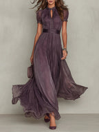 Vestido maxi de gasa morado con escote tipo abertura