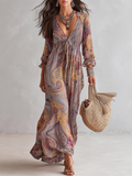 Vestido maxi de gasa con estampado paisley y escote en V