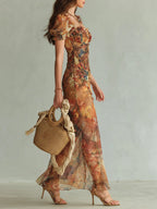 Vestido maxi de gasa naranja con estampado al óleo