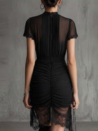 Vestido mini negro de gasa con cintura plisada
