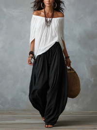 Conjunto de top blanco de hombros descubiertos y pantalón ancho