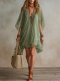 Vestido mini vaporoso verde de gasa con escote en V