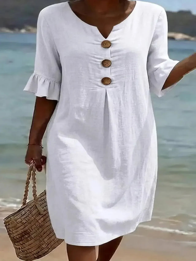 Vanesa™ | Vestido texturizado con mangas abullonadas y botones